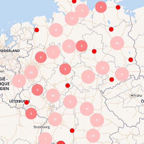 Deutschland-Karte mit unterschiedlich großen roten Kreisen, in denen Zahlen die Anzahl der GCB-Mitglieder in der jeweiligen Region abbilden.