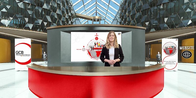Reception and entrance area of the GCB Virtual Venue with GCB employee Linda Wissing at the virtual reception desk.