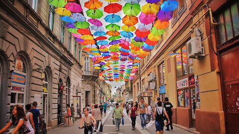 Colorful umbrellas above pedestrian zone