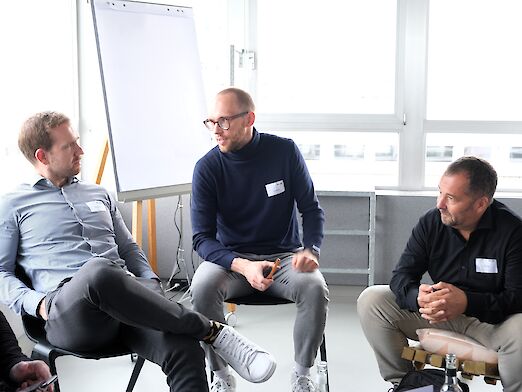 Three participants of the ebx.lab in conversation